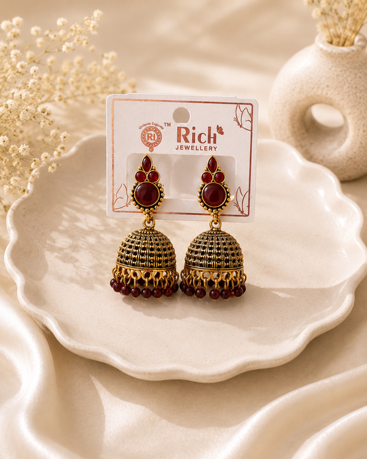 Maroon Stone Antique Gold Jhumka Earrings
